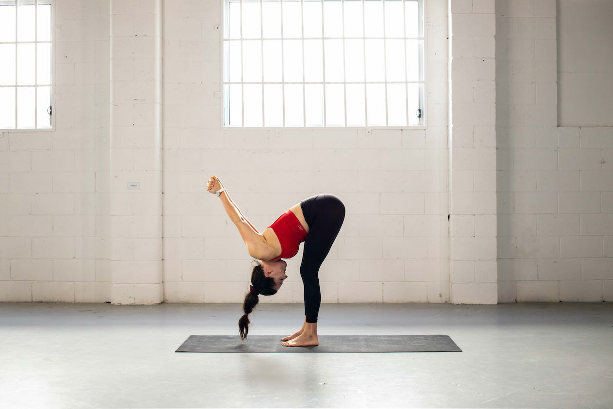 Should-You-Warm-Up-Before-Yoga-Forward-Fold-Shoulder-Stretch